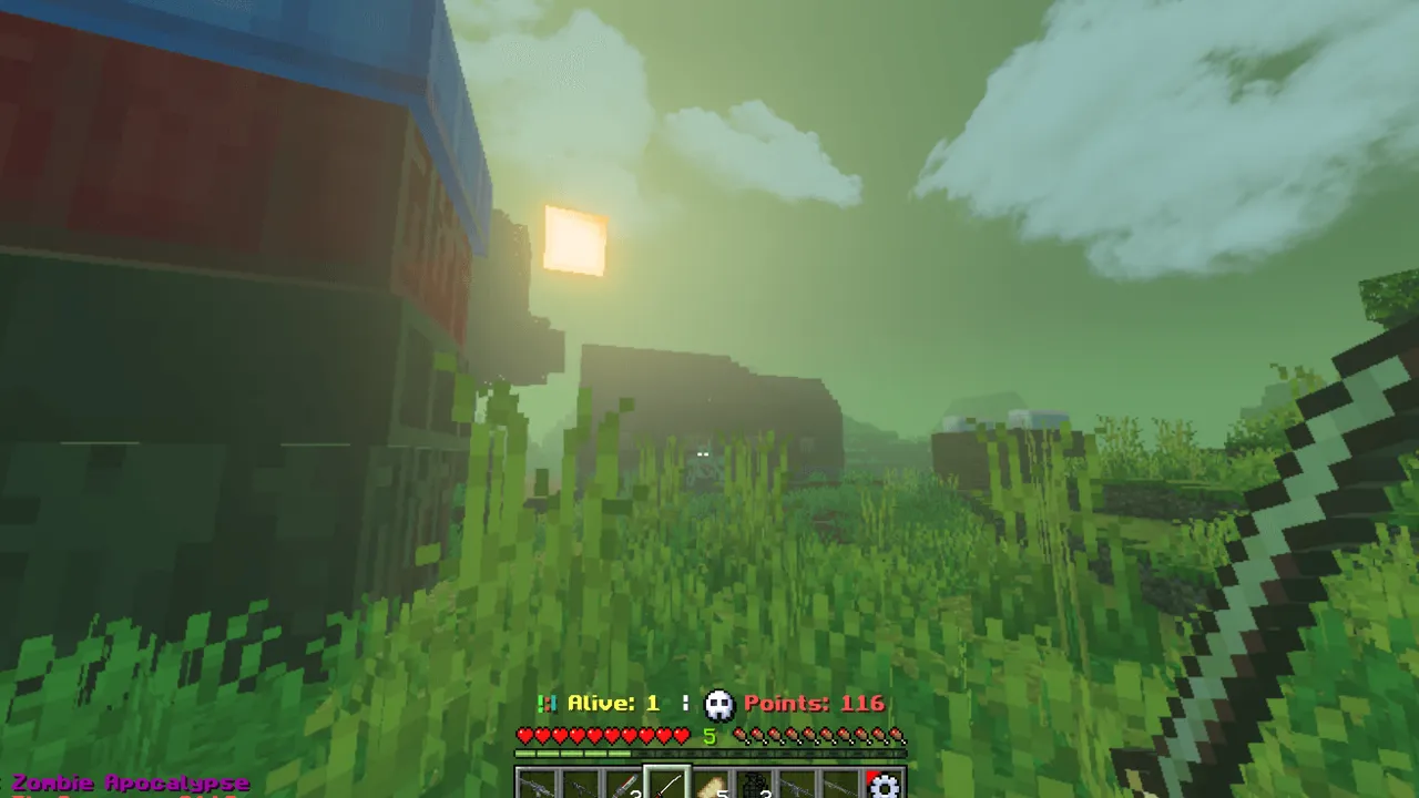 TC Zombie Apocalypse map: Player holding sword in grassy field