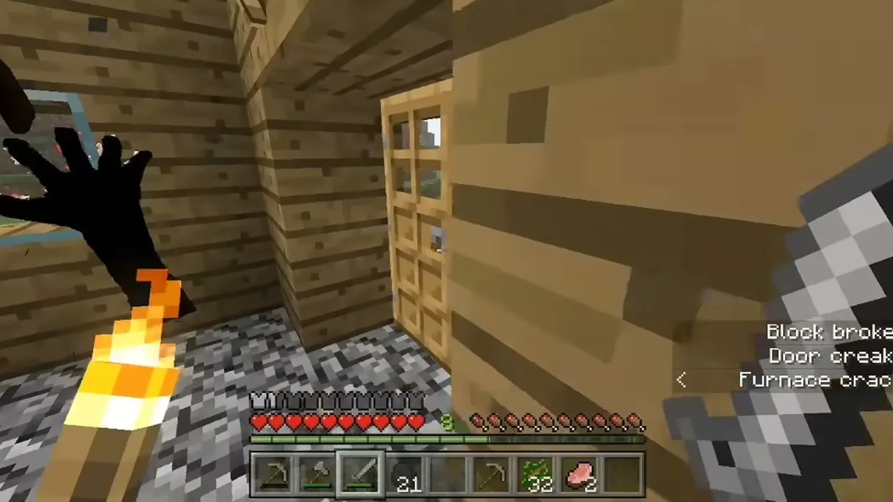 DontCry addon: A long dark hand reaching into the house