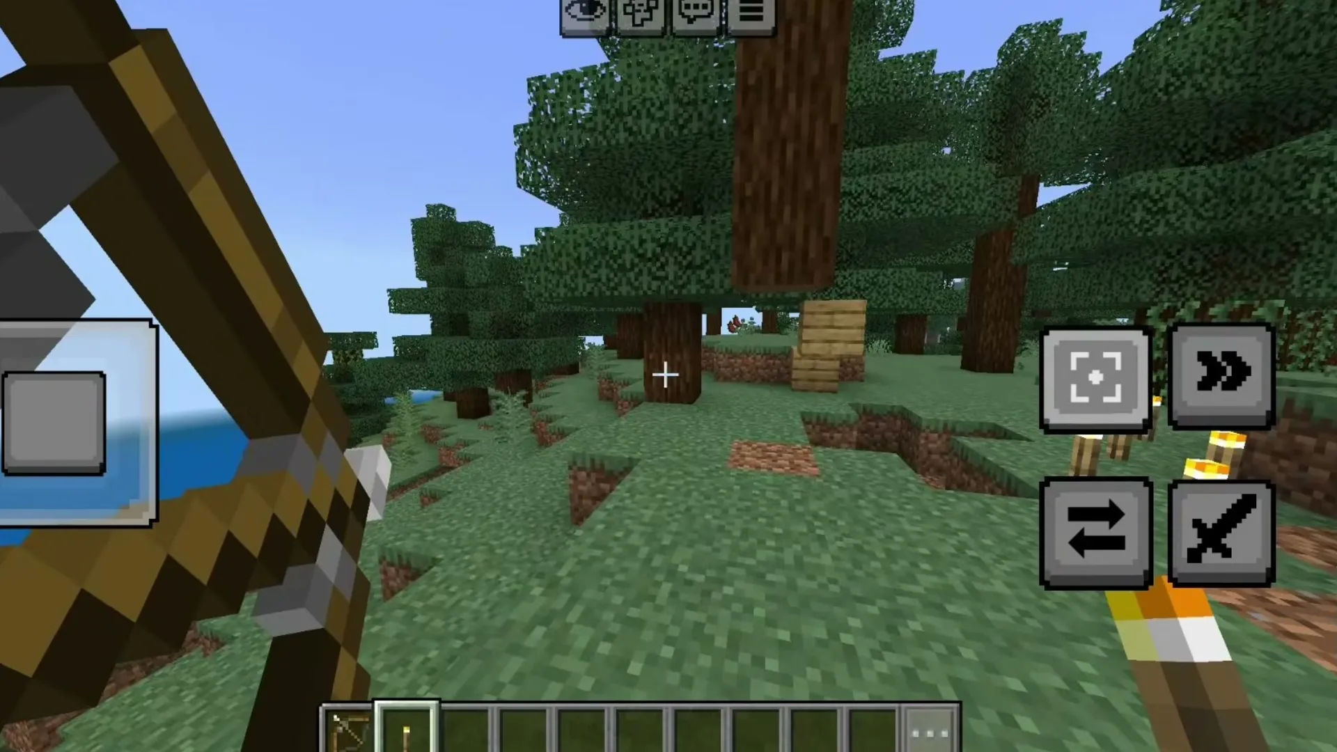 Offhand Mod (LeviLauncher) for Minecraft PE: A bow in the main hand and a torch in the offhand