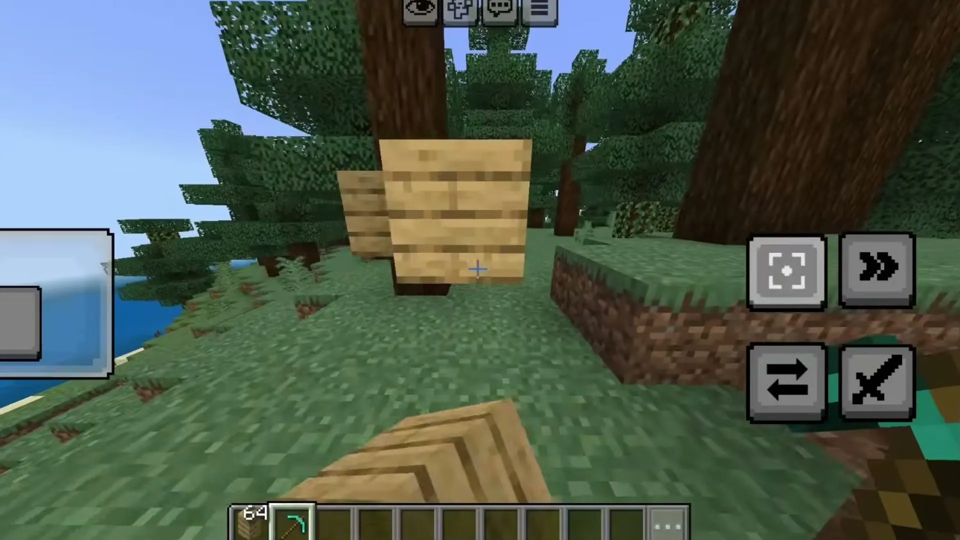 Offhand Mod (LeviLauncher) for Minecraft PE: Placing oak planks from the offhand with the Interact button