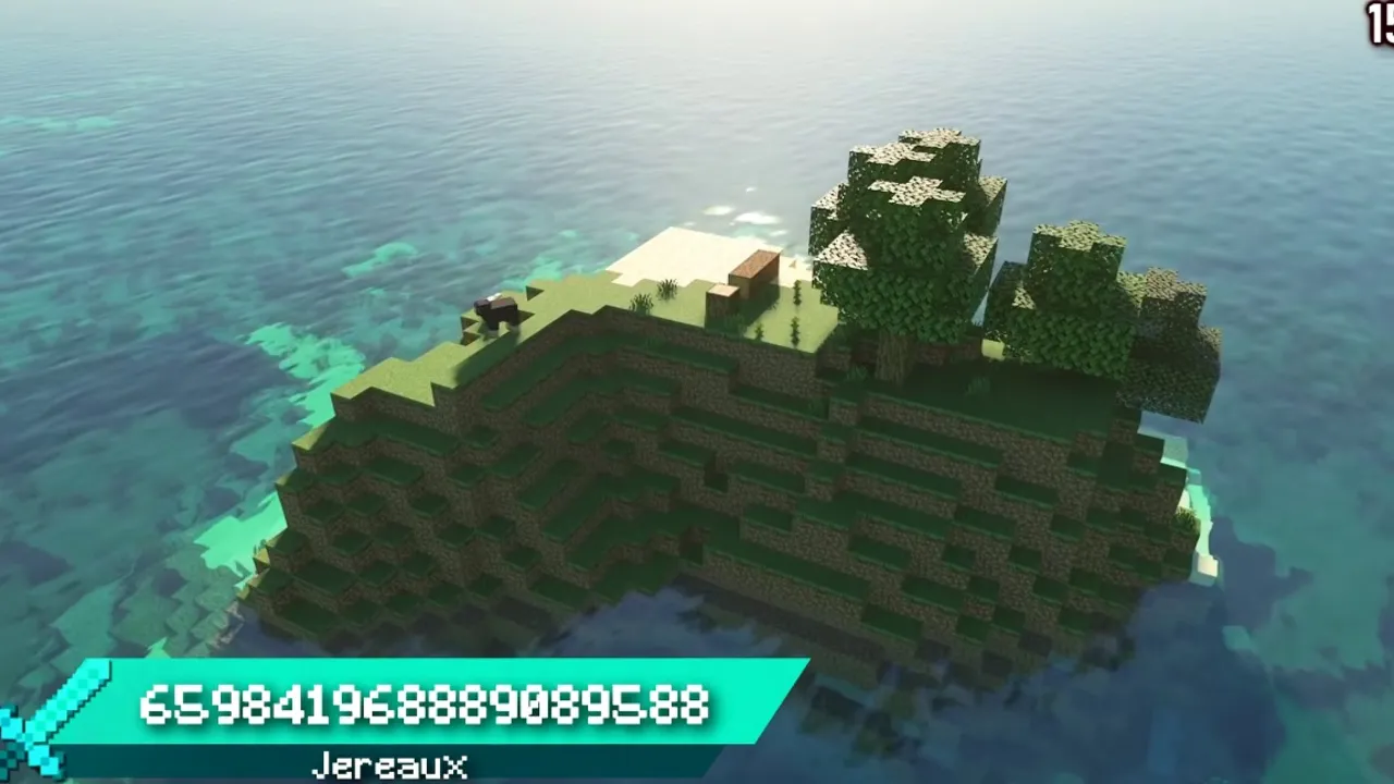 Forested Tropical Mound Rising Above Bright Coral Gardens: Forested island knoll surrounded by shallow turquoise ocean water