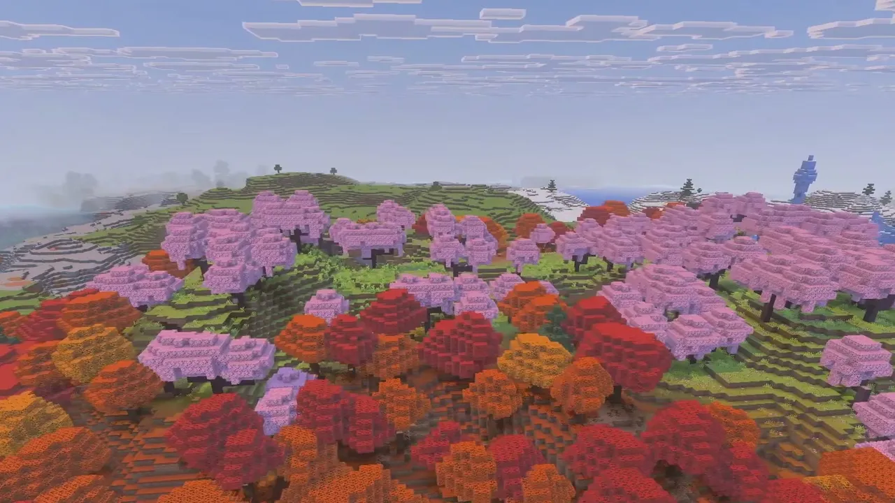 River Canyon Village at Four Biomes: Hillside where pink cherry trees meet orange poplar foliage