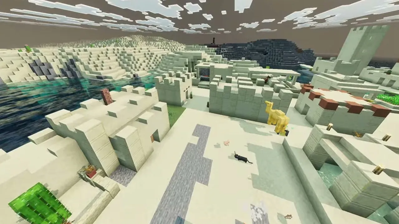 Coastal Bay Desert Village: closer view of sandstone village streets, houses, and towers along the bay