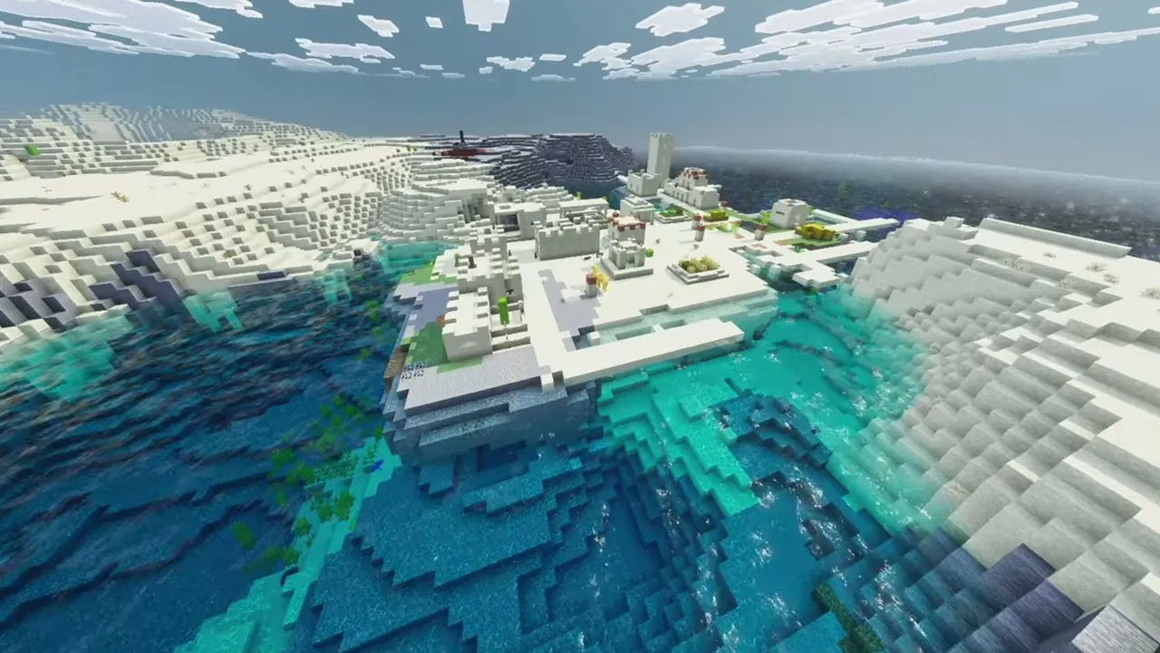 Coastal Bay Desert Village: wide view of a coastal desert village built out over a turquoise coral bay