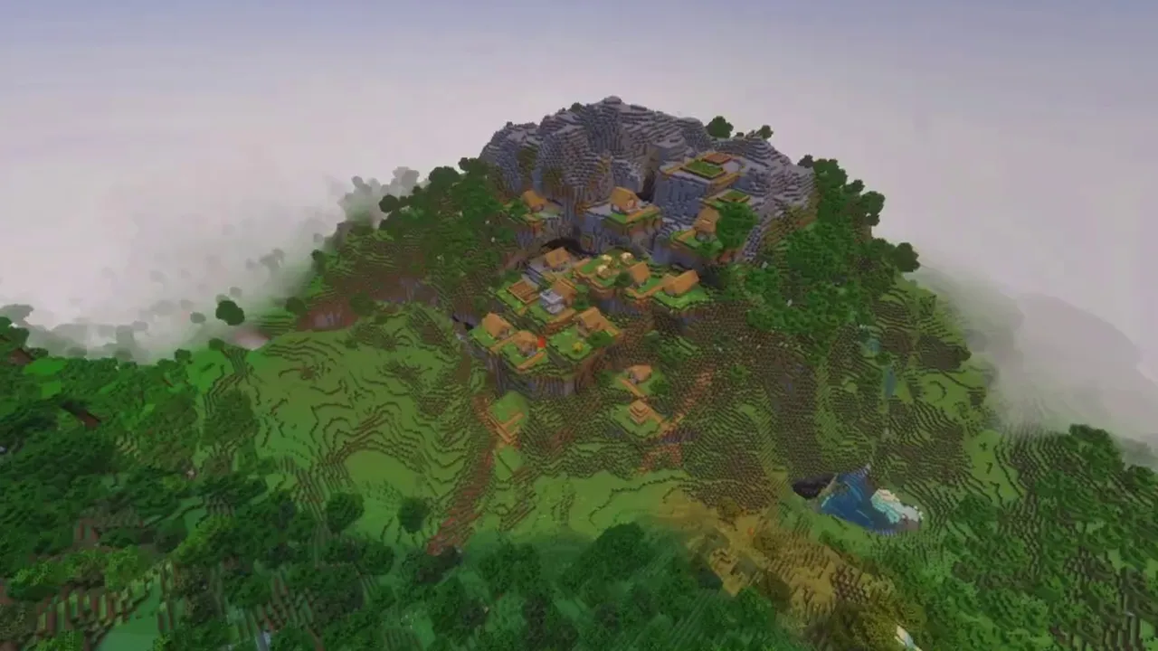 Mountain Crown Village: stone mound holding village buildings ringed by snow peaks