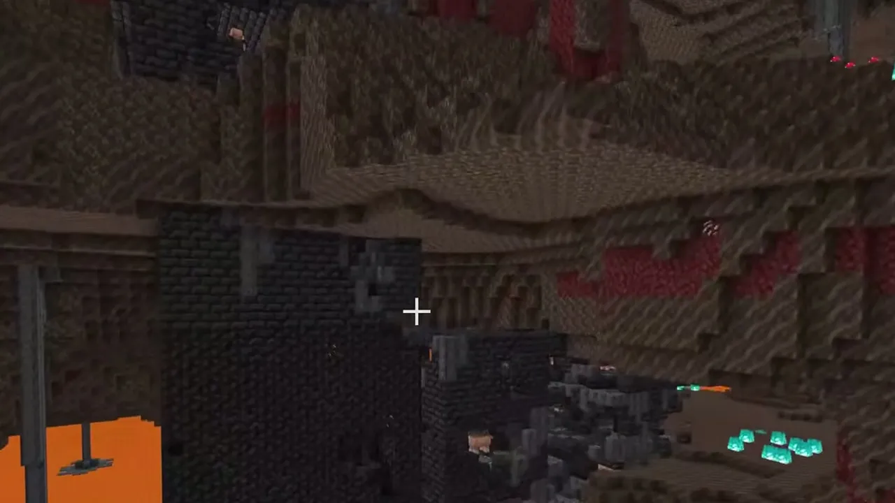 Snowy Spawn Cavern Portal with Nether Fortress: Nether fortress bridges and pillars over a lava lake near soul fire
