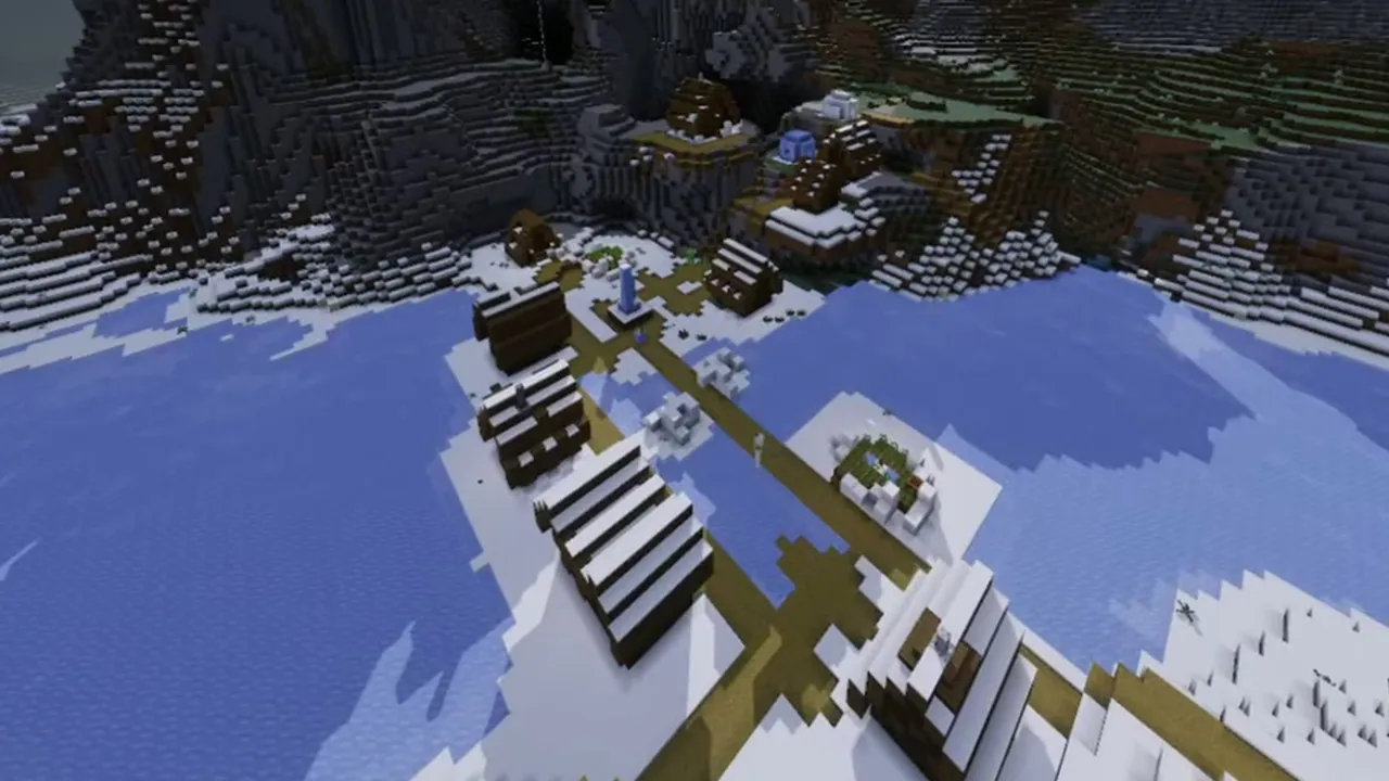 Frozen Bay Village Under Dark Mountain Cliffs: Closer view of snow-topped cottages and walkways crossing the frozen bay