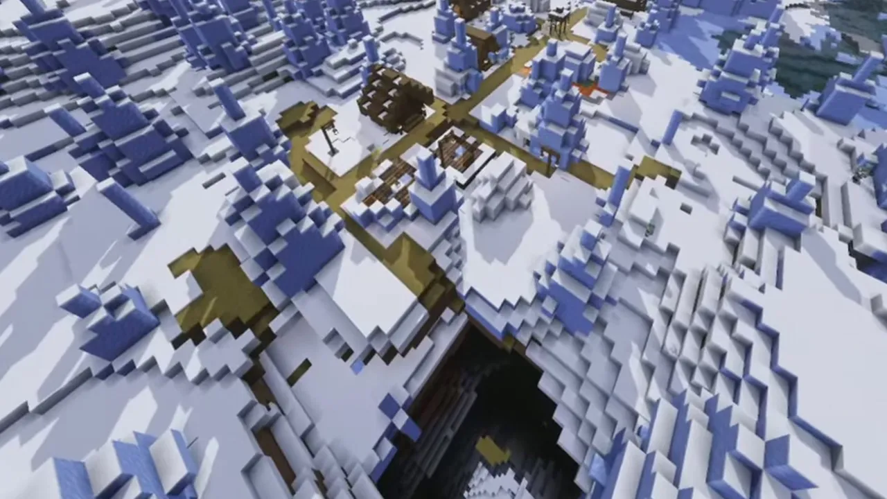 Ice Spikes Snowy Village Above Ravine: Closer view of village cabins and wooden paths beside an open ravine