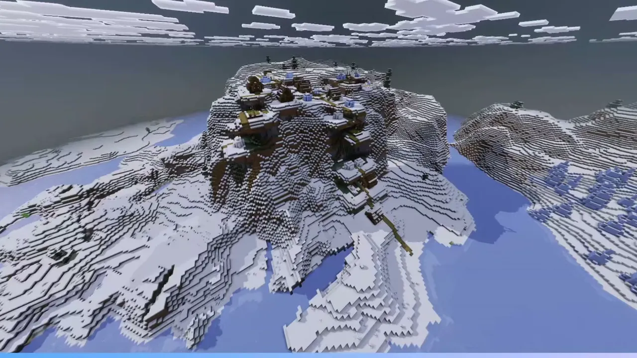 Hilltop Snowy Village Over Frozen Water: Wide view of a snowy village on a steep rocky island surrounded by frozen water