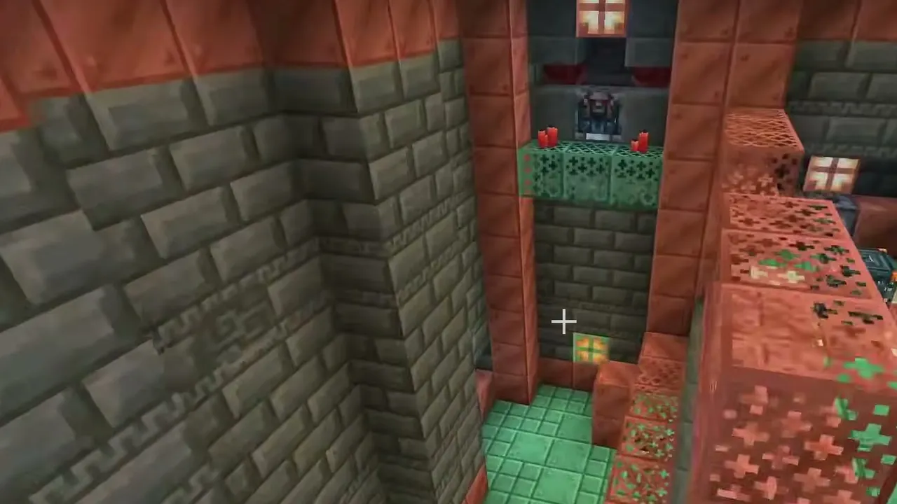 Valley Village & Copper Trial Chamber: Interior corridor of a trial chamber with oxidized copper blocks and tuff brick walls