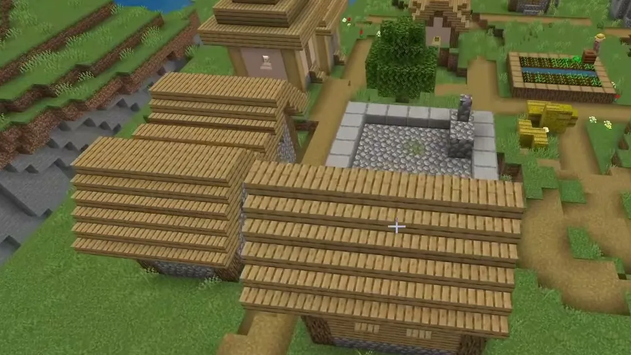 Four-Blacksmith Plains Village & End Portal: Overhead view of a plains village blacksmith and wooden houses