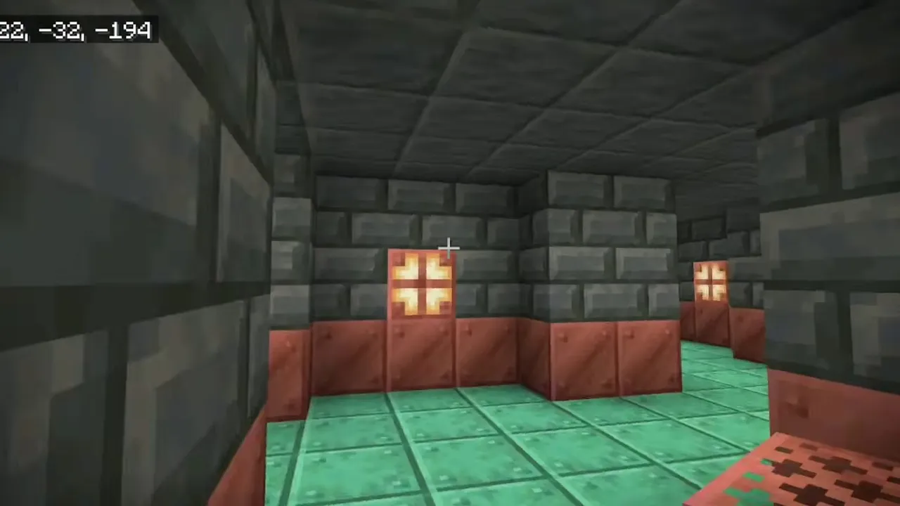 Monster Spawner Dungeon and Trial Chamber Beside a Sulfur Cave: Trial chamber hallway with copper grates, tuff bricks, and glowing copper bulbs