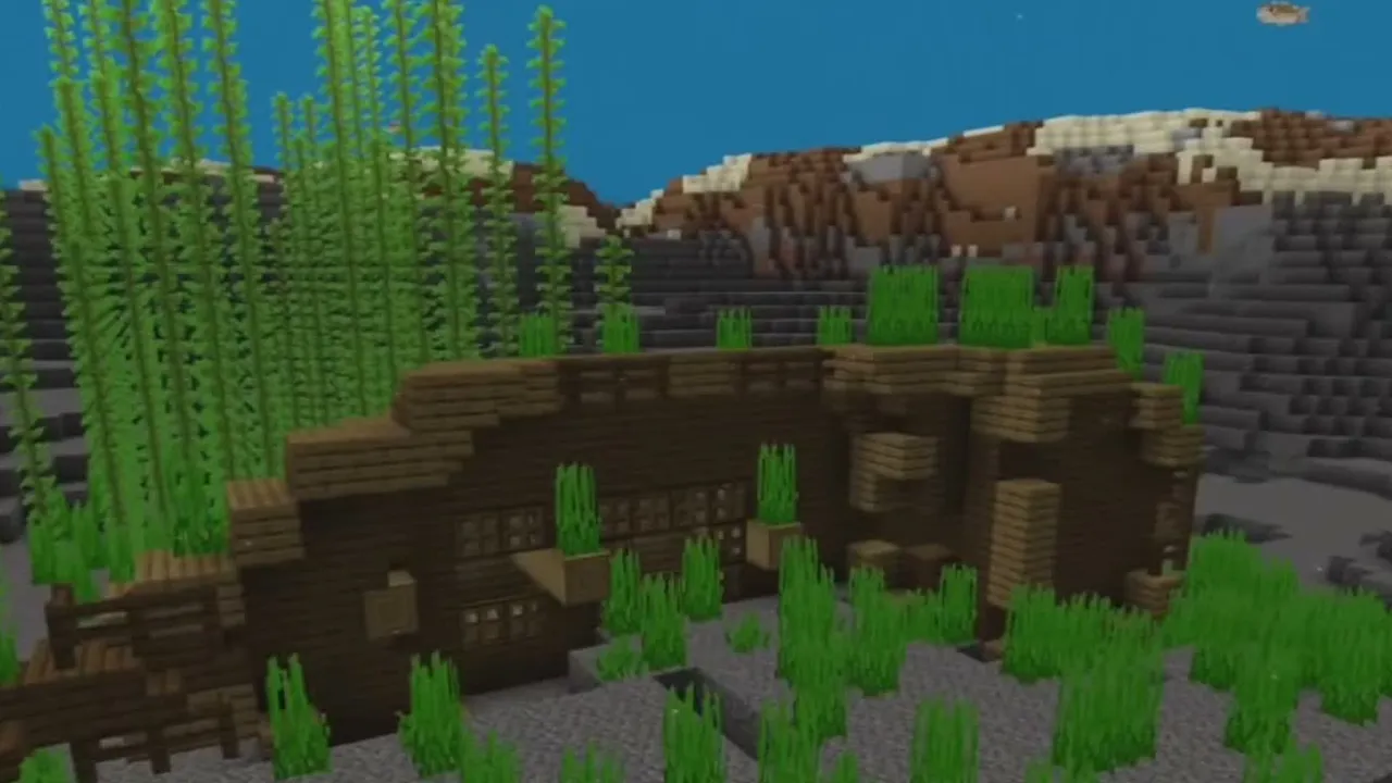 Acacia Island with Trial Chamber: Sunken wooden shipwreck on the ocean floor near the island