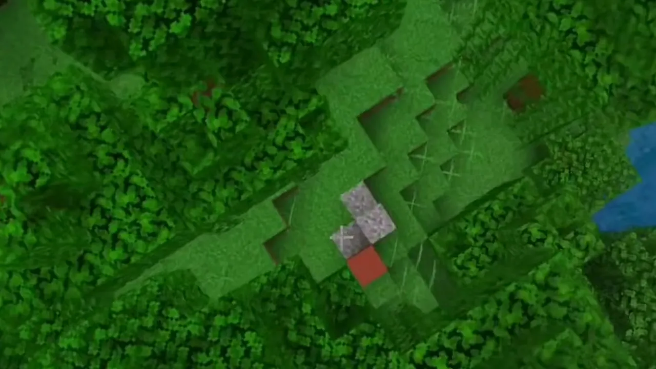 Woodland Mansion and Jungle Clearing Trail Ruins: Overhead view of exposed red terracotta and gravel trail ruins in a grassy jungle clearing