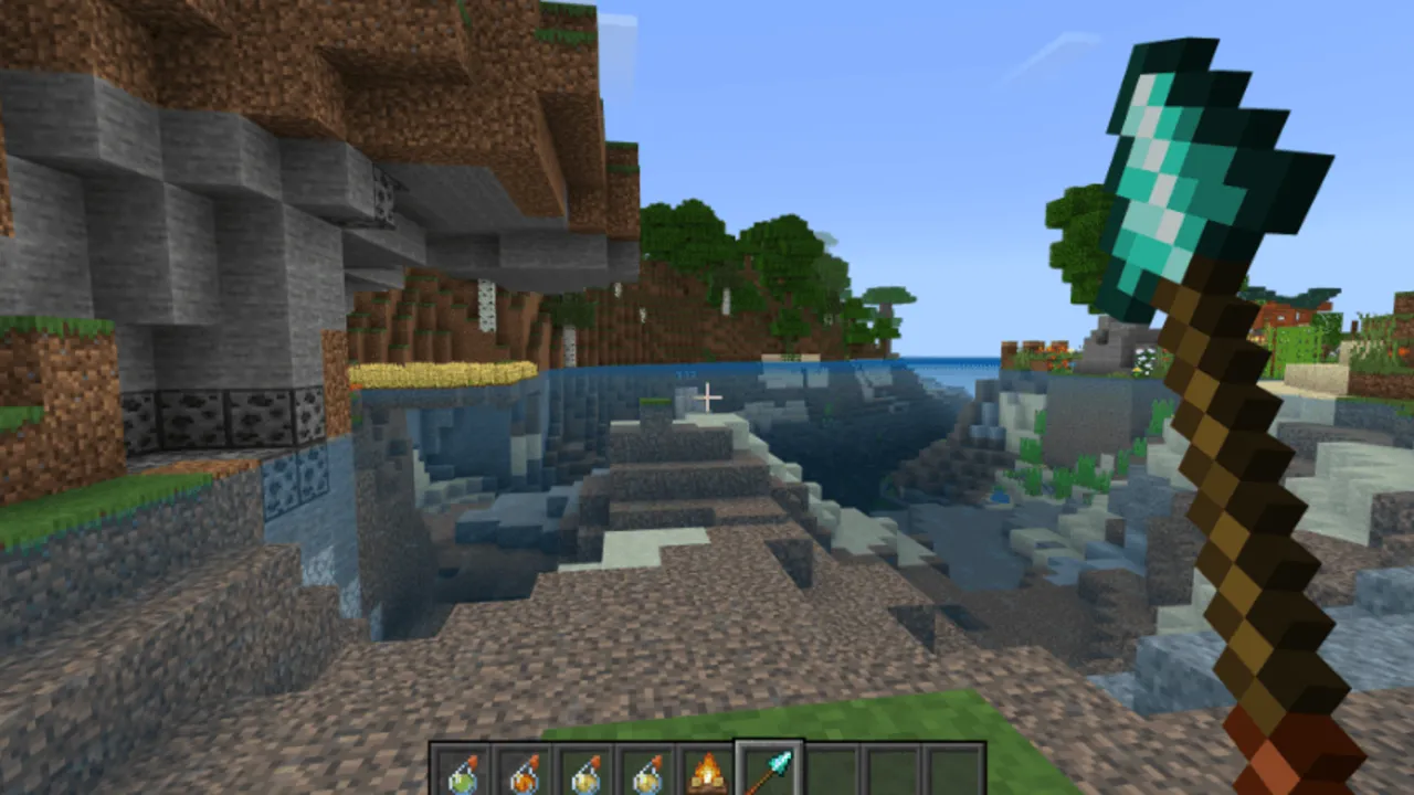 FPS Booster Pack for Minecraft PE: Player holding diamond pickaxe near water