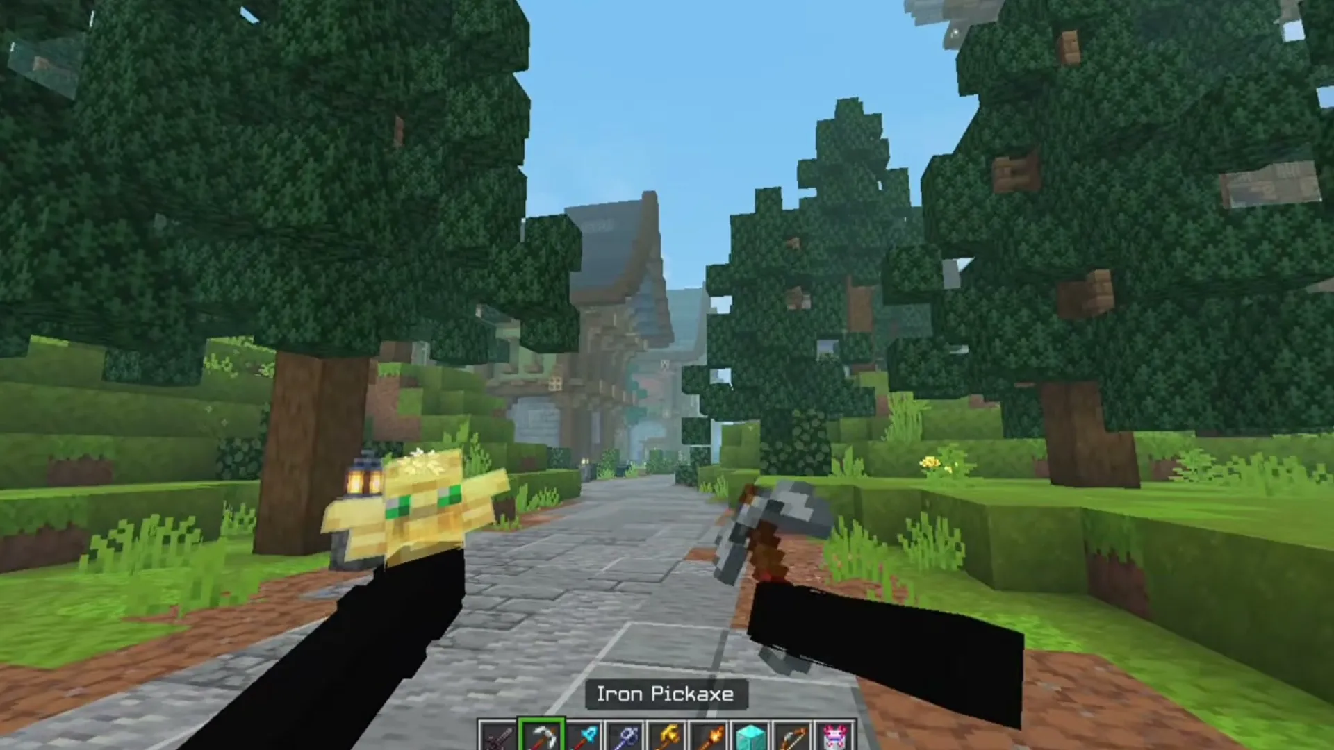 View Model A&S texture pack for Minecraft PE: Player holding iron pickaxe on stone path